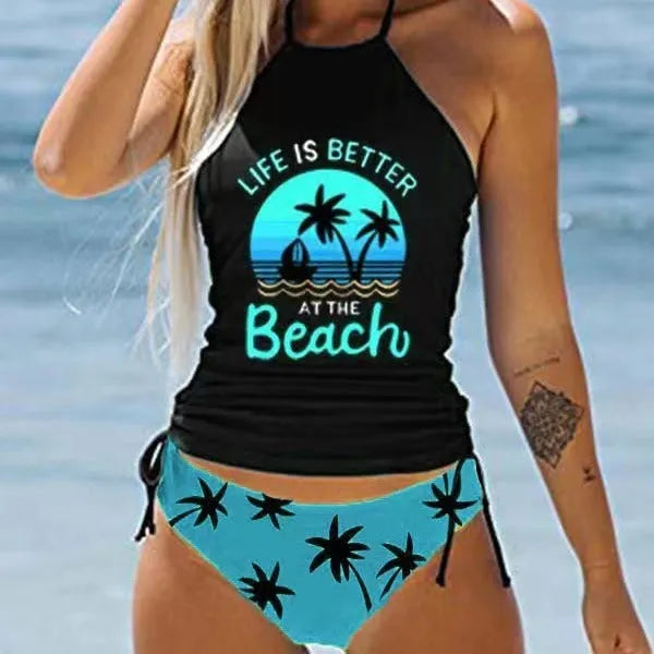 Conservative style women's swimsuit with colourful cartoon print and matching shorts.
