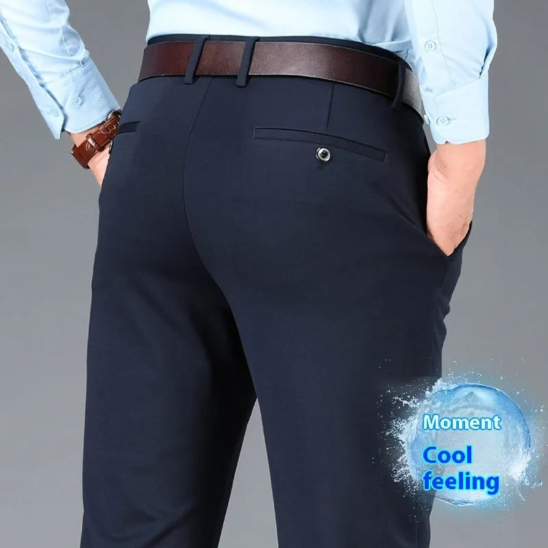 Men's straight-leg trousers in a dark colour on a hanger, showing mid-waist and zip fly design.