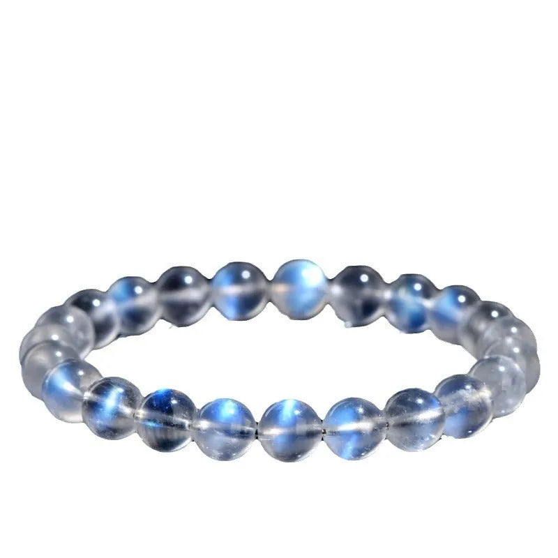 Natural cream body blue moonlight crystal bracelet in a minimalist unisex style.