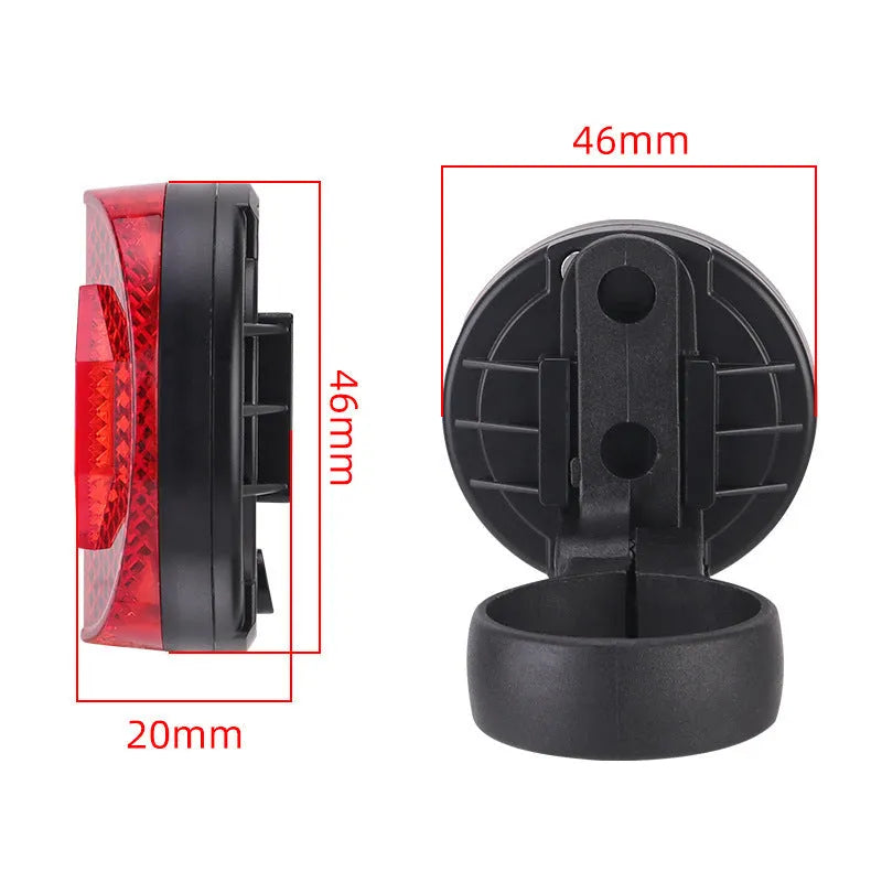 Red plastic anti-theft bicycle taillight bracket mounted on seat post with reflective surface