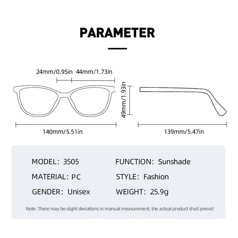 Round retro plastic sunglasses on a table, showing bright black frame with grey lens.