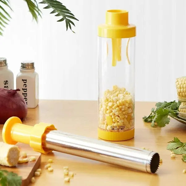 Yellow cylindrical corn stripper kitchen tool with stainless steel blades for removing kernels