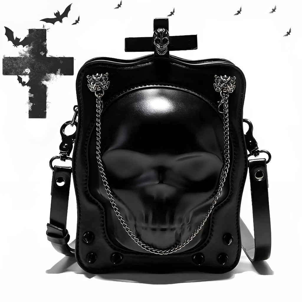 Black vertical square PU leather crossbody bag with embossed skull design, stitching, rivets, and a chain strap.