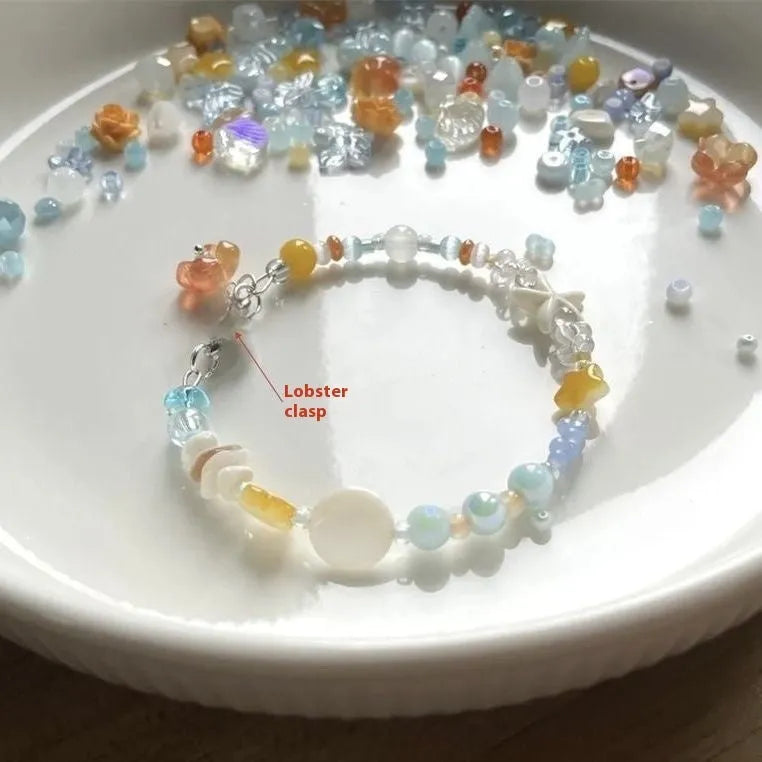 Mixed-material orange sea summer bracelet with diamond shape and round alloy elements