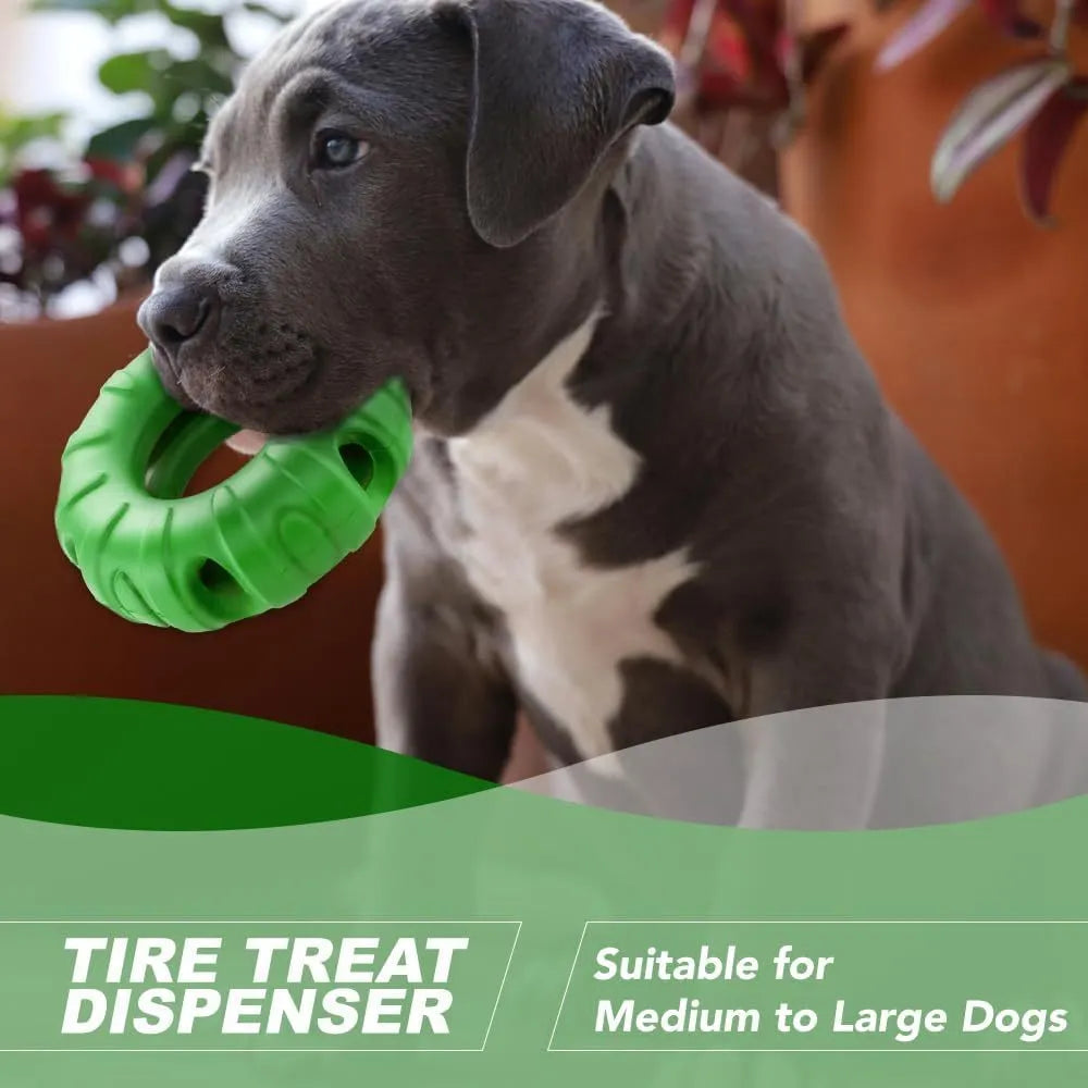 Blue rubber tyre-shaped dog chew toy with oval openings, shown as a slow feeder and interactive puzzle toy