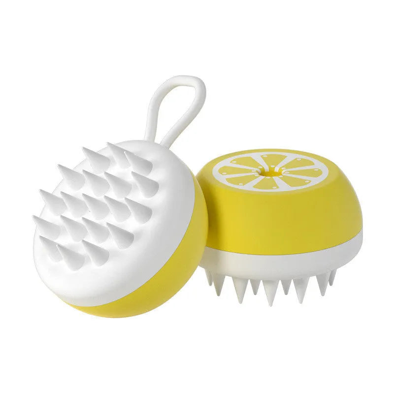 Yellow silicone pet bath brush with massage head on a blue background.