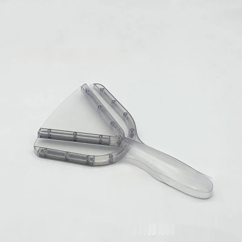 Adjustable telescopic bottle and can opener with a non-slip red handle on a kitchen counter.