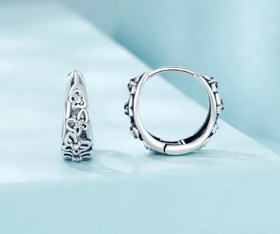 Retro hollow butterfly zircon earrings in sterling silver measuring 14mm by 5mm