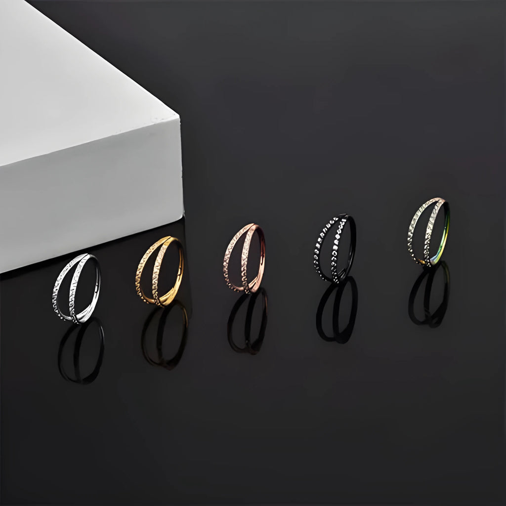 G23 titanium alloy nose ring with monoclinic diamond coating in steel or gold colour, showing size options.