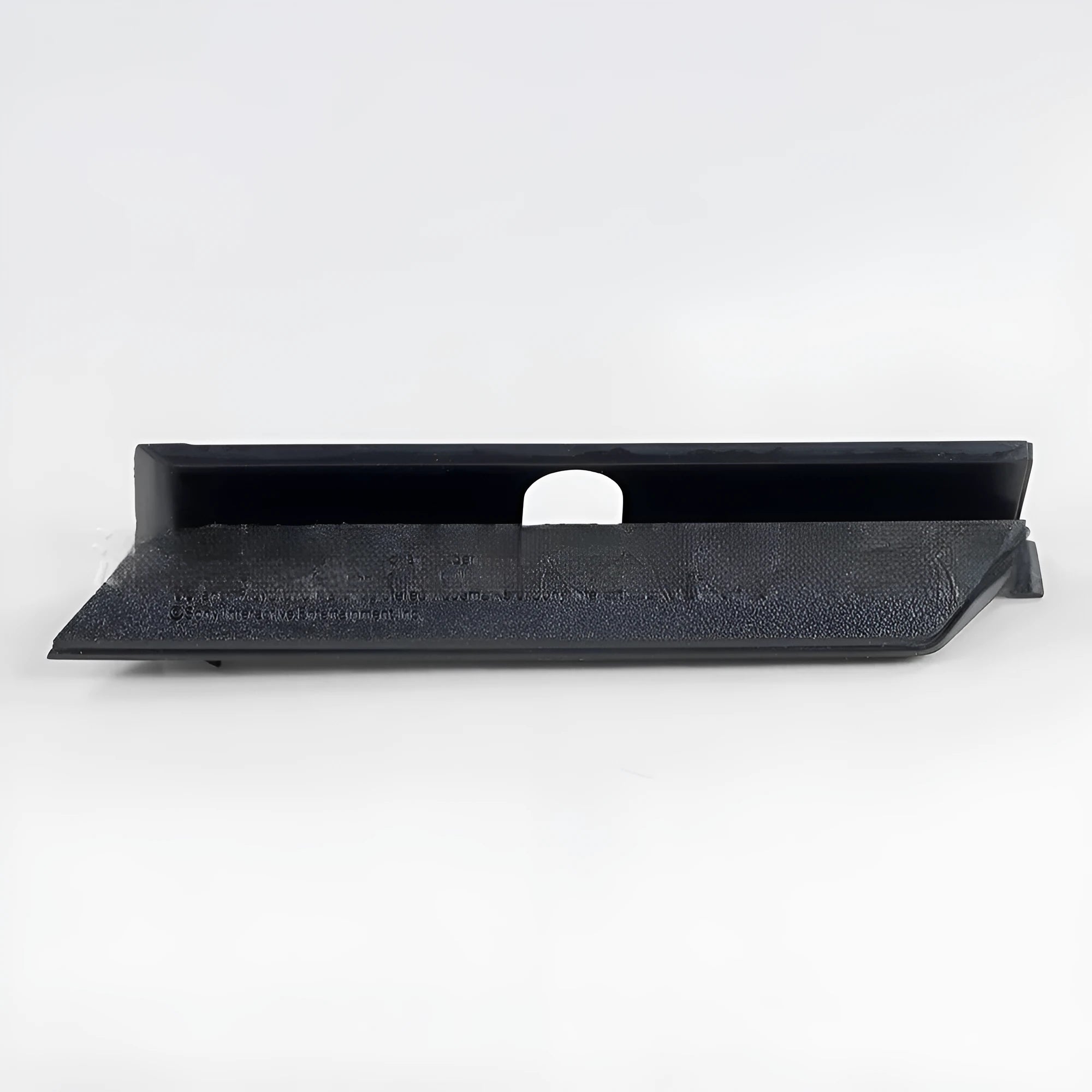 Black and white plastic hard drive cover for computer component organisation and protection