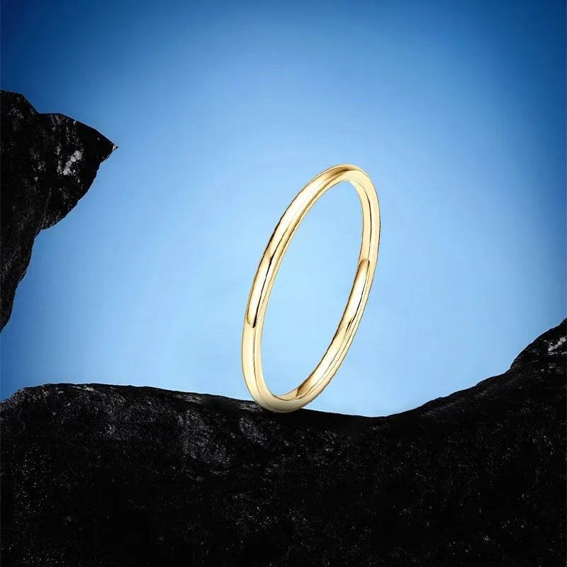 Simple geometric sterling silver bracelet ring on a wrist, shown in traditional and star design variants.