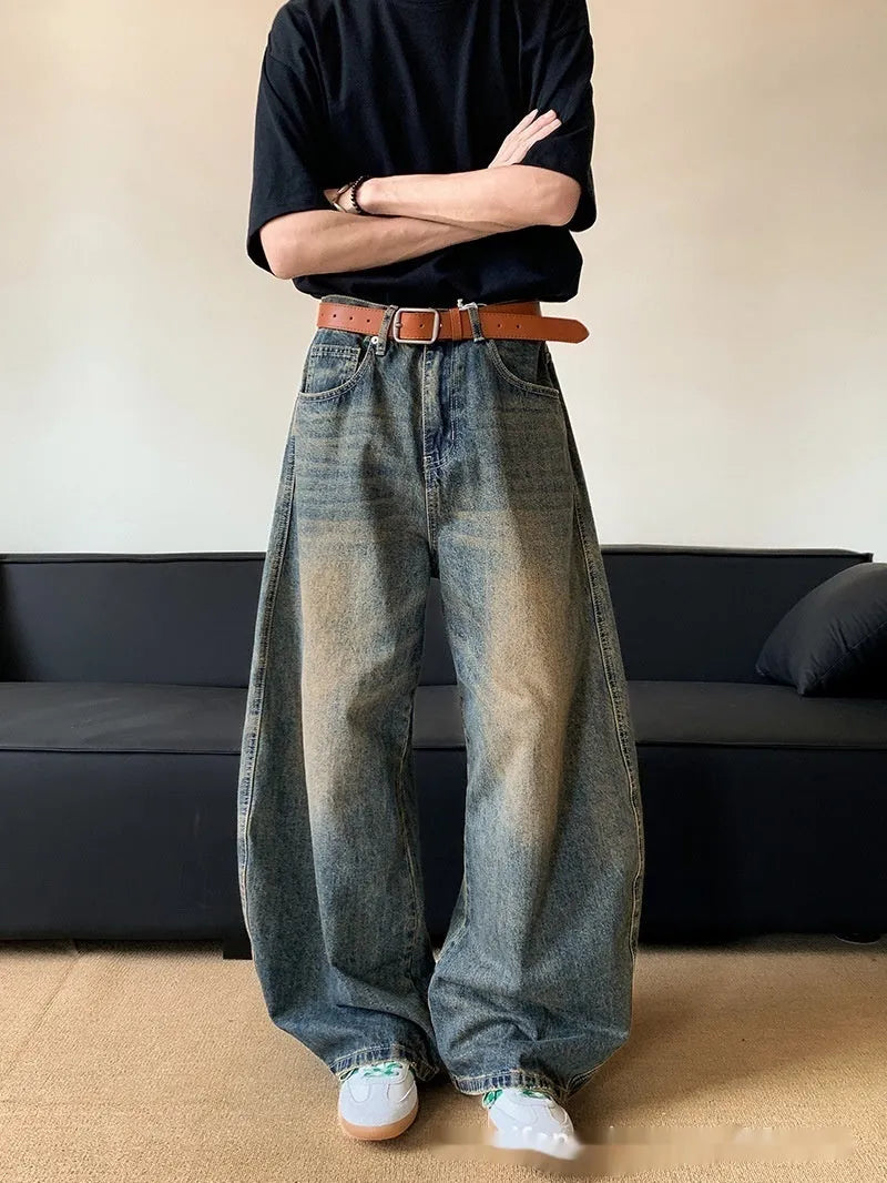 Men's retro blue distressed wide-leg denim jeans with micro-elastic fabric and zipper fly