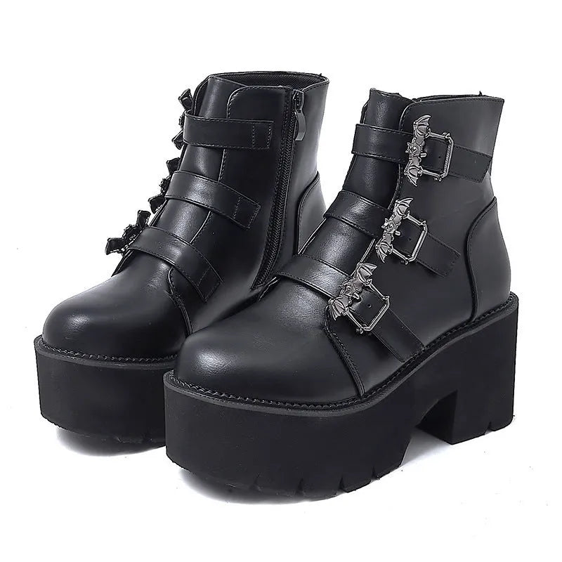 Black women's punk gothic short boots with bat buckle and side zipper on thick heel.