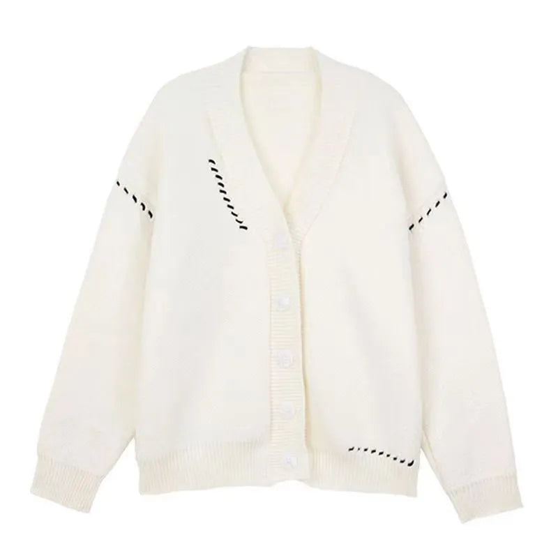 Women's loose-fit black knitted cardigan top coat with long sleeves on a hanger.