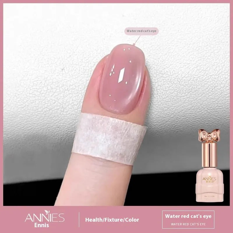 Micro glass bead cat's eye gel nail polish bottle showing cat's eye visual effect