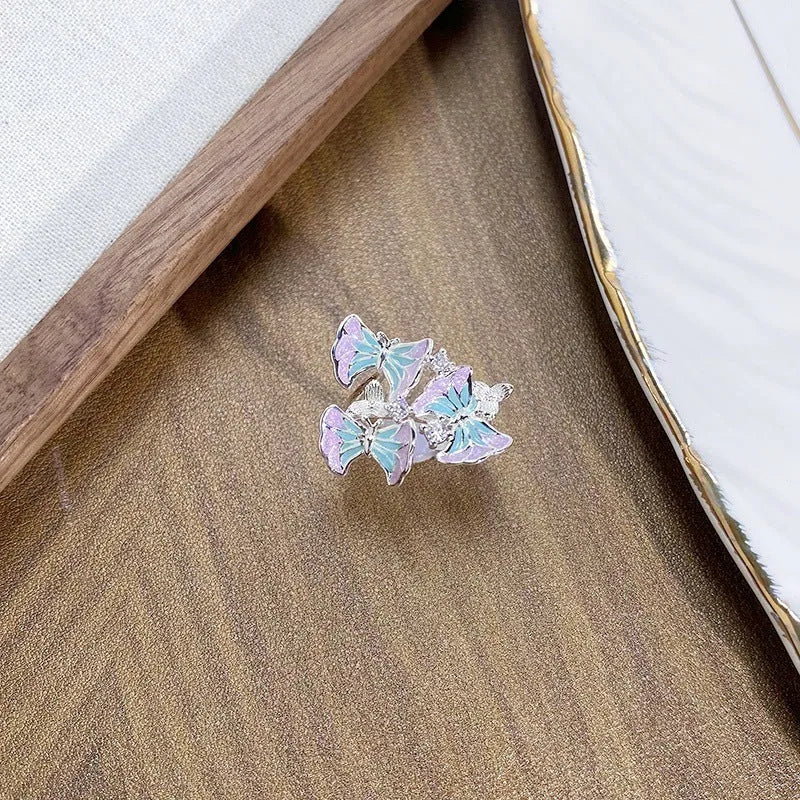 Adjustable copper insect ring with an irregular dripping oil texture finish in a choice of colours.