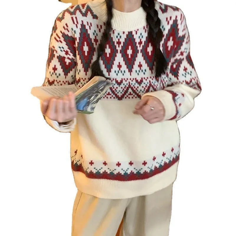 Red and white striped loose retro pullover knitted top on a hanger.