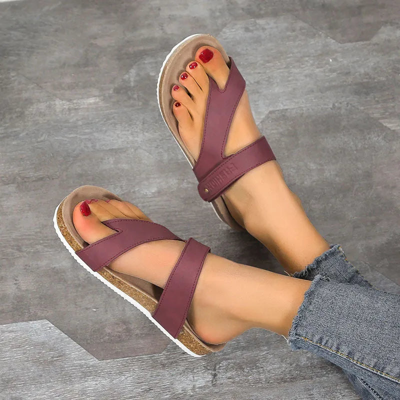 Blue flat toe ring thick-soled flip-flops on a white background.