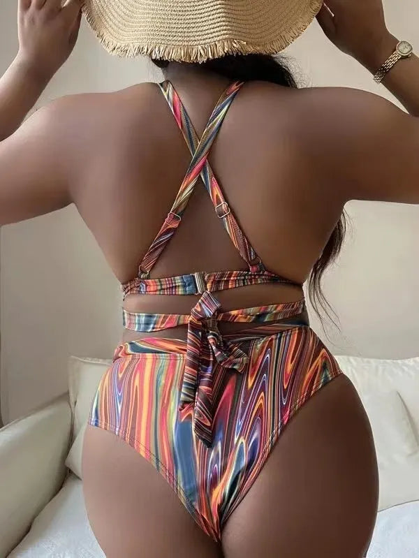 Women's floral high-waist bikini swimsuit top and pants in plus sizes.