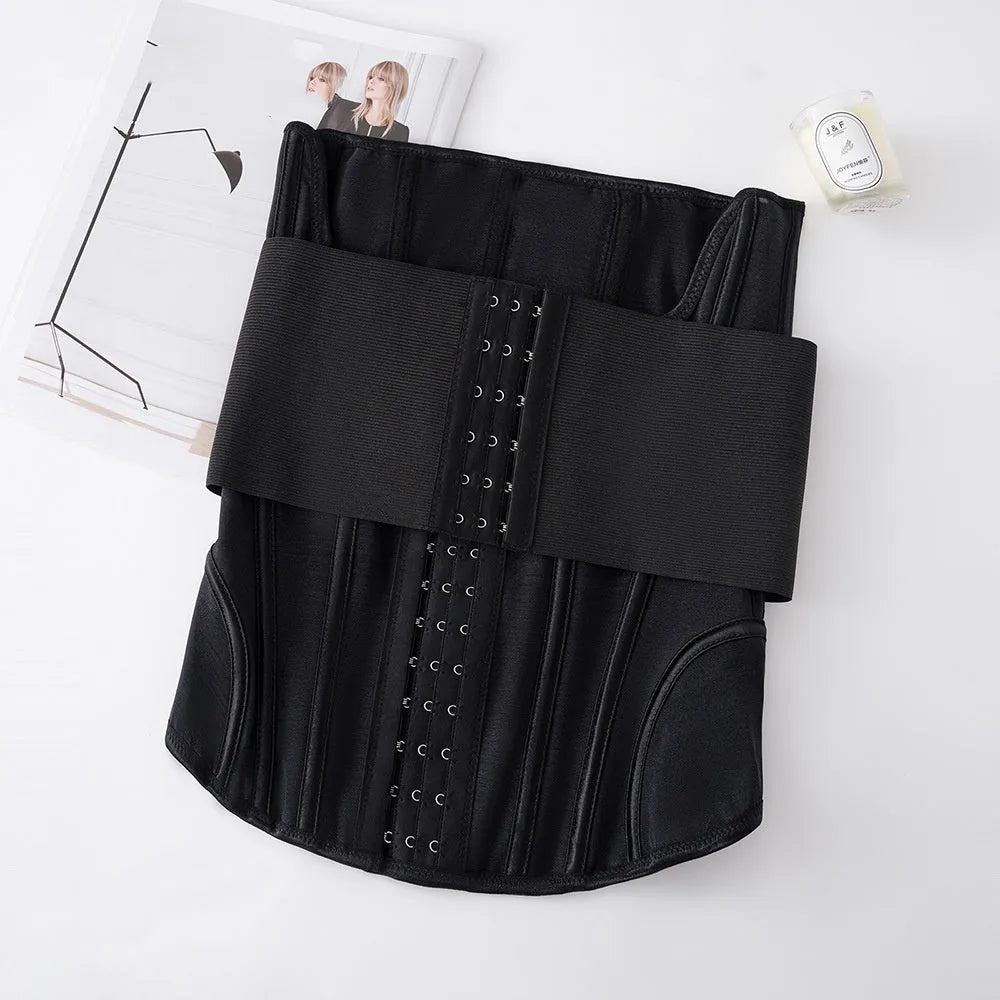 Black adjustable nylon belly band for waist training, shown with its belt tie, on a mannequin.
