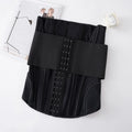 Black adjustable nylon belly band for waist training, shown with its belt tie, on a mannequin.