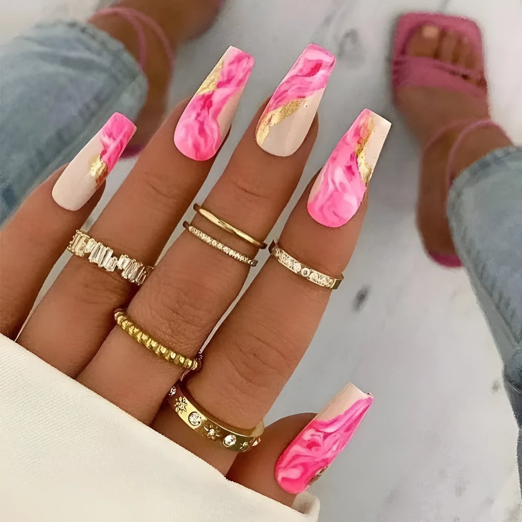 Wearable manicure set showing 24 artificial nails with rose, tulip, leopard and XINGX designs