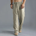 Men's linen loose casual sports pants in khaki, side view, on a hanger