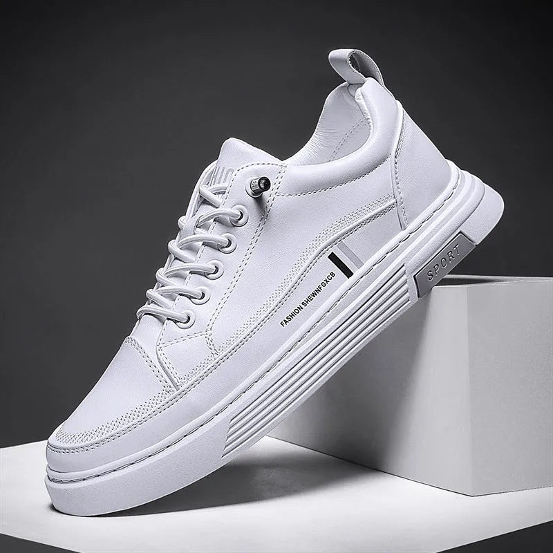 Men's white skate shoes with elastic band closure and low-top design showing stitching details