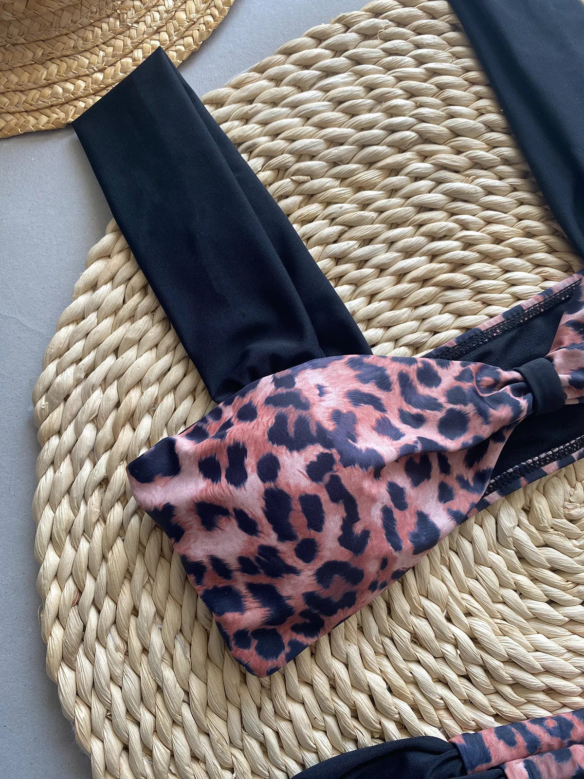 Women's leopard print and black bikini set with tube top and split-style briefs