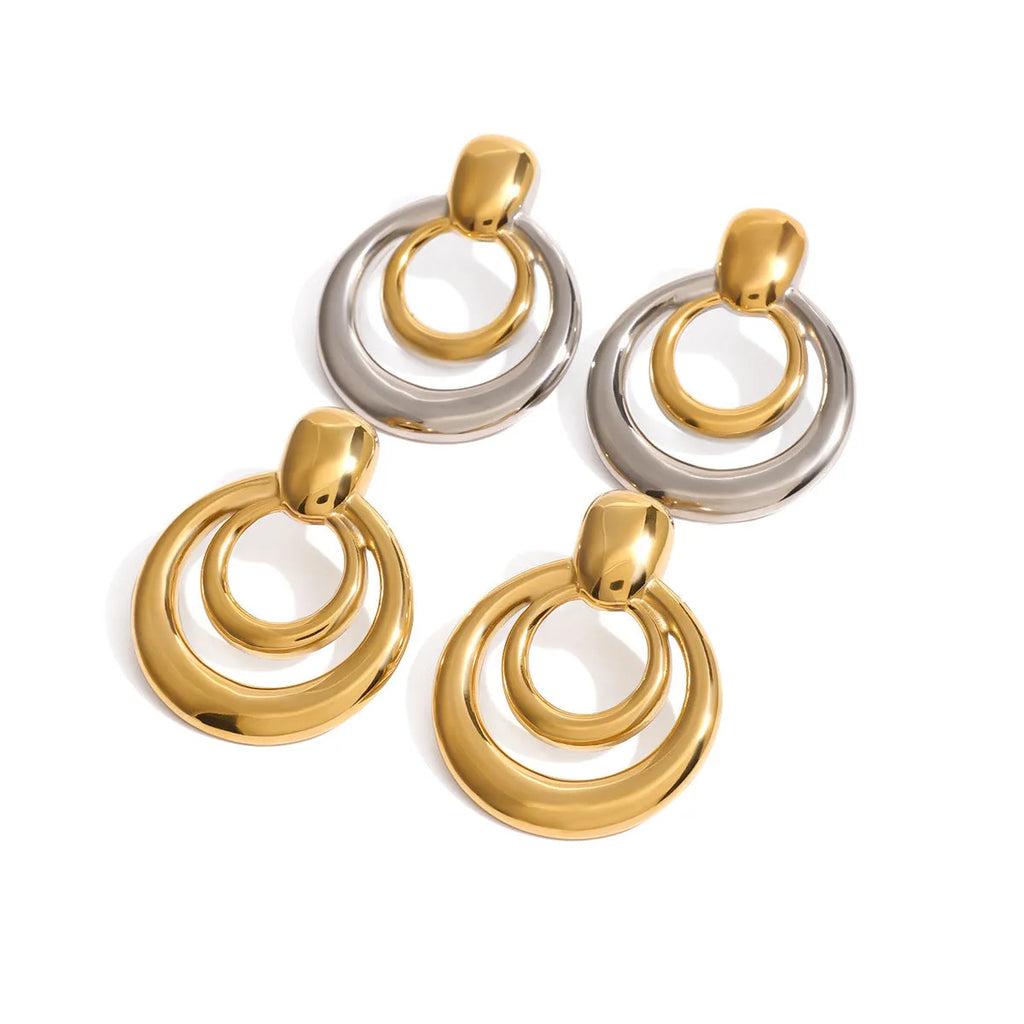 Round double-layer hollow stud earrings with 18K gold electroplated finish on titanium steel