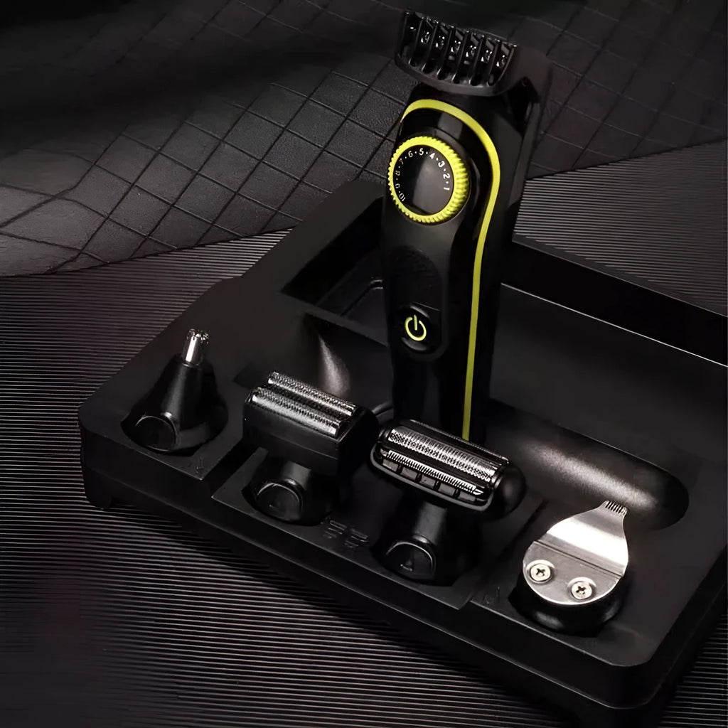 Black KM-696 USB rechargeable electric hair clipper with stainless steel blades on white background