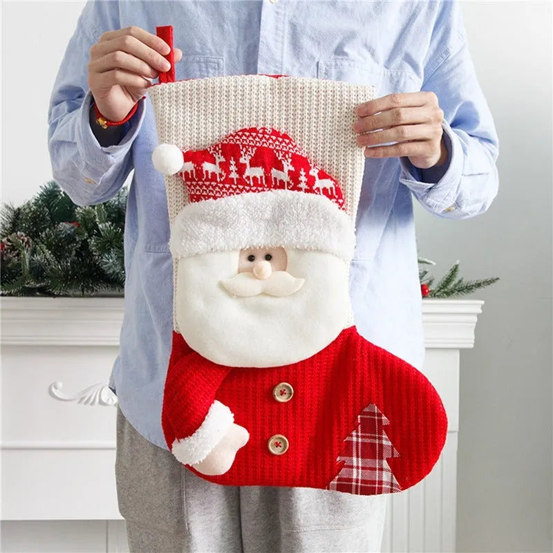 Large red white knitted Christmas stocking with Santa Claus design for fireplace decoration
