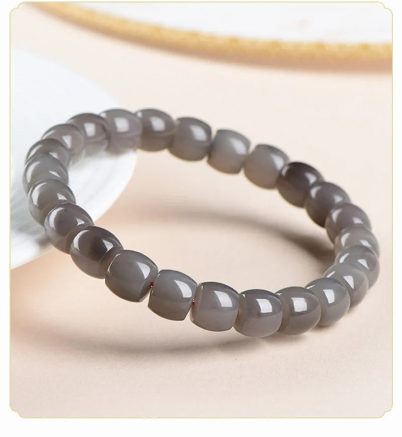 Natural smokey violet Hetian jade straight cut bracelet with 8x9mm round beads.