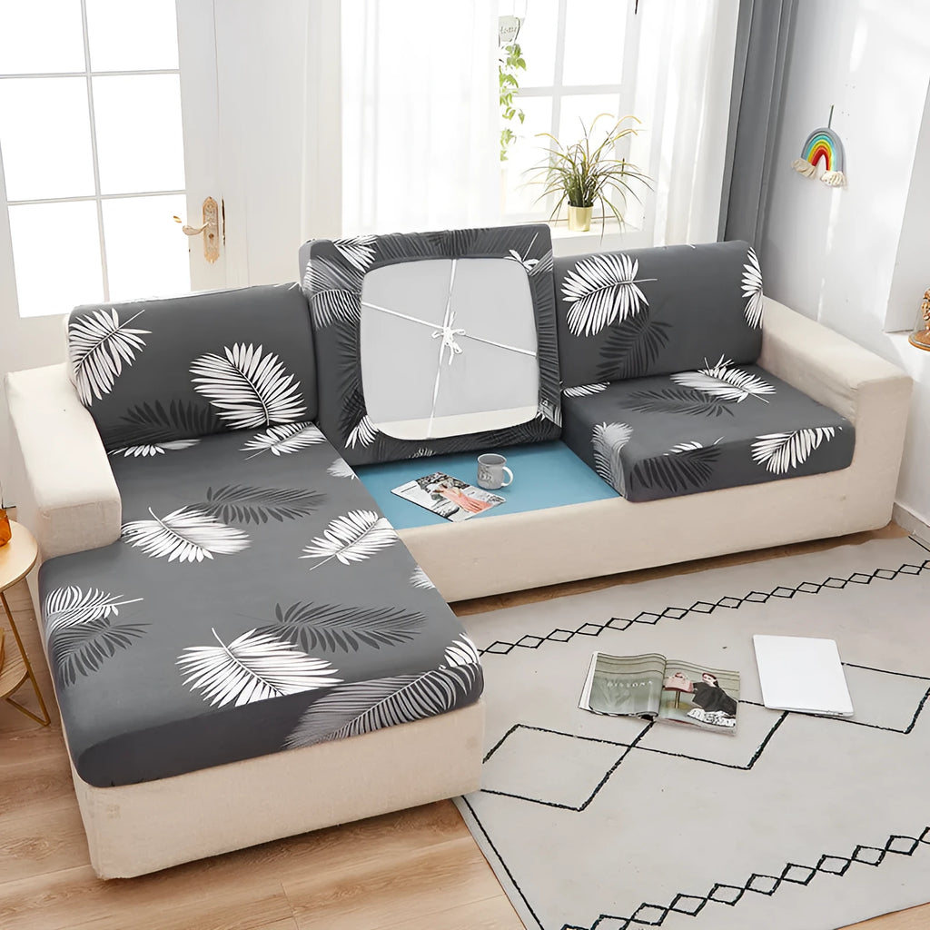 Printed non-slip polyester sofa seat cover with elastic edges in Happy Life Green colour on a single sofa