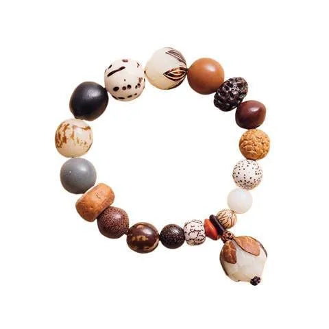 Handmade brown bodhi seed beads bracelet with 18 beads, shown on a wrist.