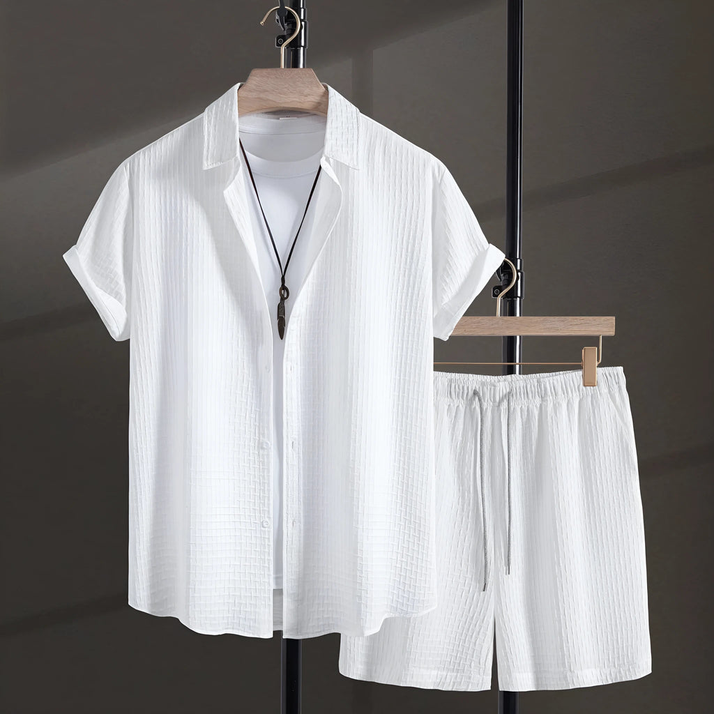 Men's casual cotton blend beach shorts suit in black, showing short sleeve shirt and matching shorts.