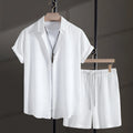Men's casual cotton blend beach shorts suit in black, showing short sleeve shirt and matching shorts.
