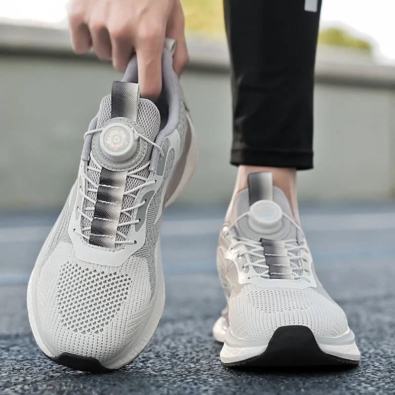 Rotating button running shoes in beige with Fly-kit mesh upper and buckle fastening