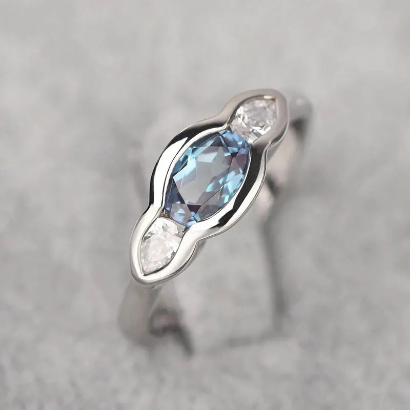 Women's geometric ellipse ring with inlaid zircon stones in white gold colour
