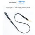 Black high-grade PU leather dog traction belt with a metal ring, shown alongside its attached rope.
