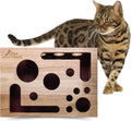 Solid wood square maze cat toy in natural wood colour on floor