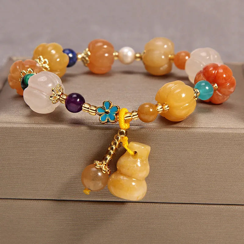 Women's yellow agate crystal bracelet with gold silk cord in adjustable khaki design