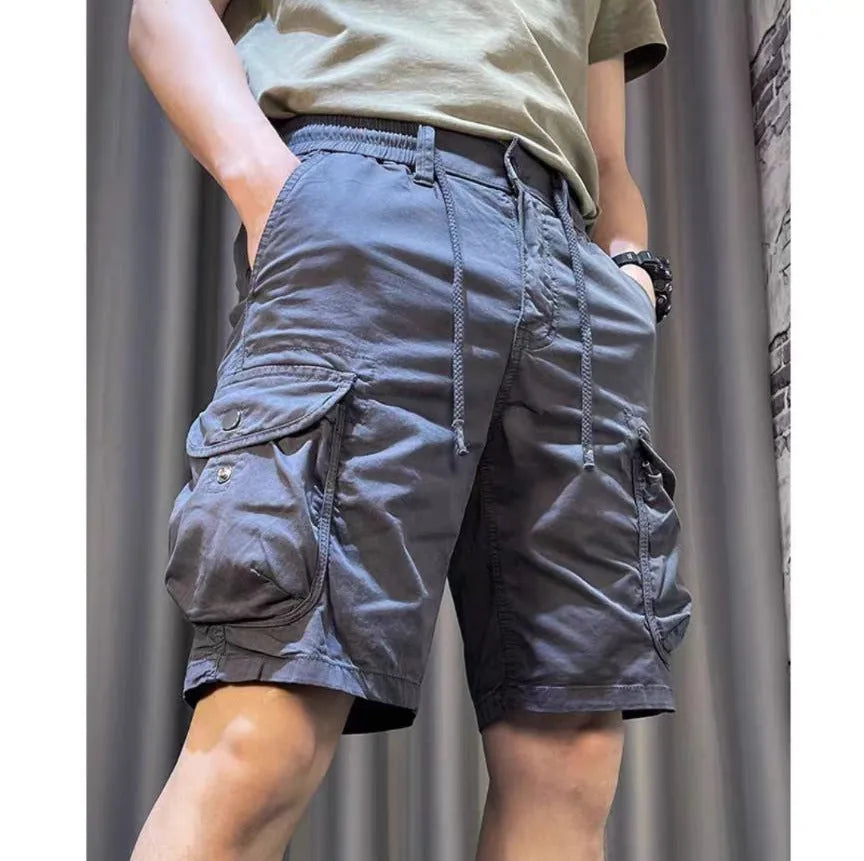 Loose straight-leg casual overalls in khaki with multiple pockets and a Korean-style fit.