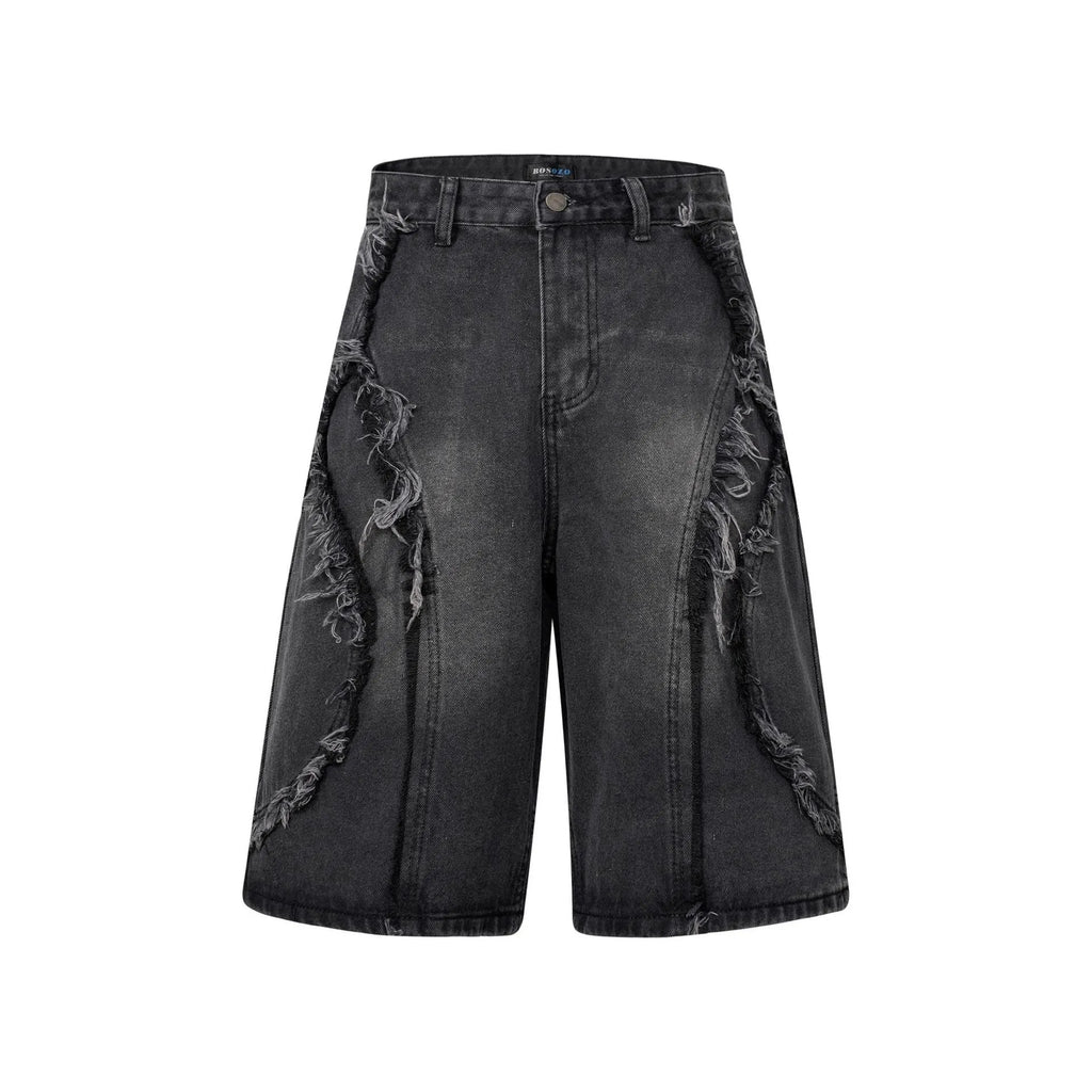 Distressed denim shorts with raw edge detailing in black, dark blue and light blue colours