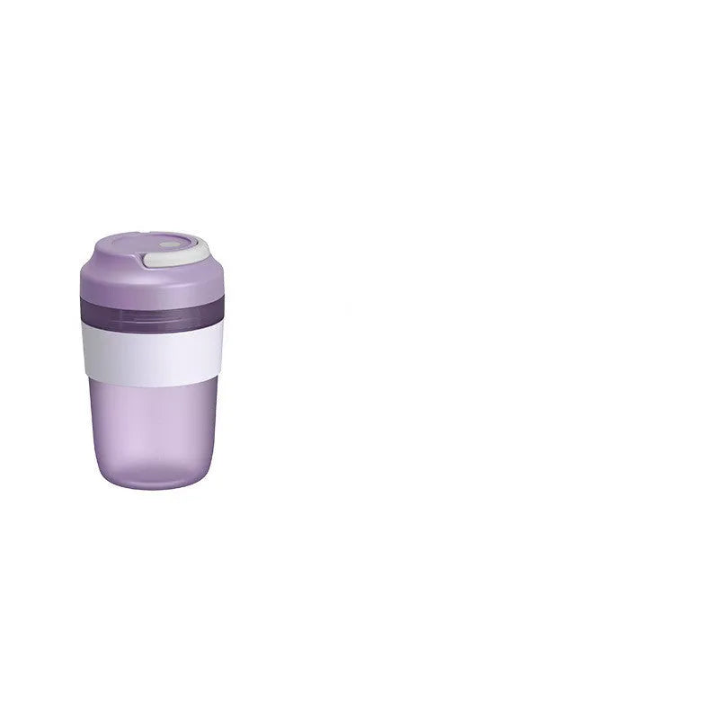 Portable 400ml blender juicer cup with four stainless steel blades in purple, green, or orange colours