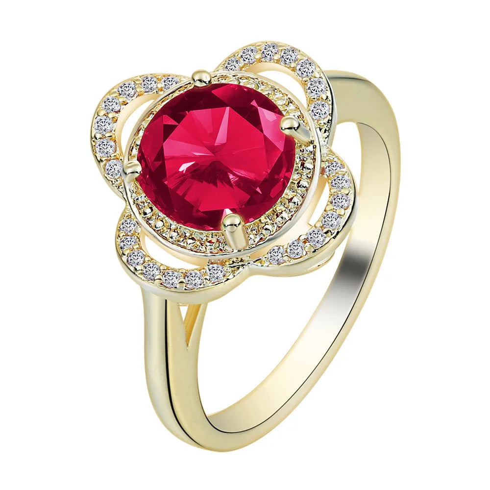 Close-up of a copper fruit-shaped ring with a central zircon stone in colour 10-6-1395.