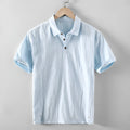 Men's loose fit linen casual shirt in a solid colour, shown in a light gray option.