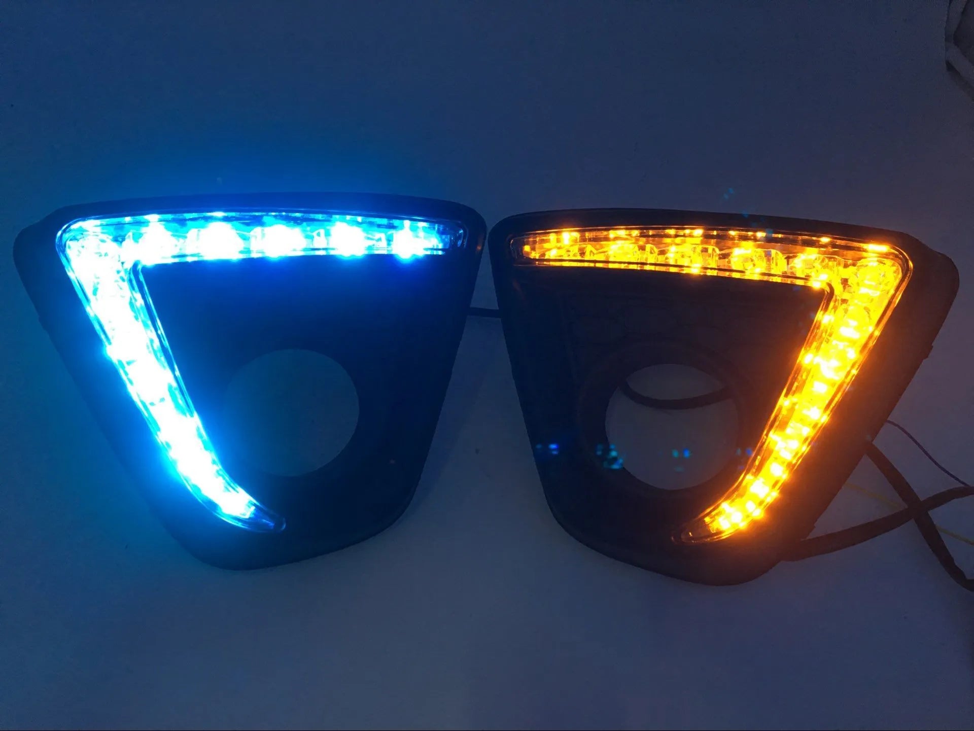 Set of two silver electroplated daytime running light units for a Mazda CX-5 car.