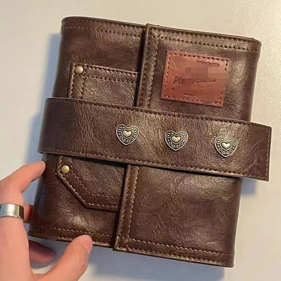 Creative retro brown A7 notebook with leather-style buckle and loose-leaf binding