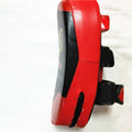 Black and red square hand-held martial arts training target with a double buckle.